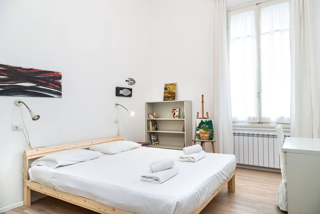 The First Bedroom - The comfortable double bed with soft bed-linen and towels