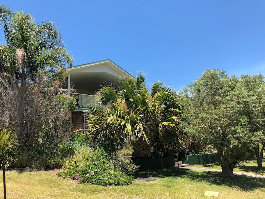 House from the street. Large deck overlooking ocean.