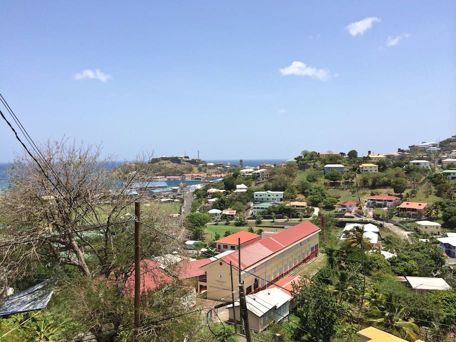 View turned slightly to right of 1st pic (taken different time of year) looking down into the city center, with Fort George in distance on hill.