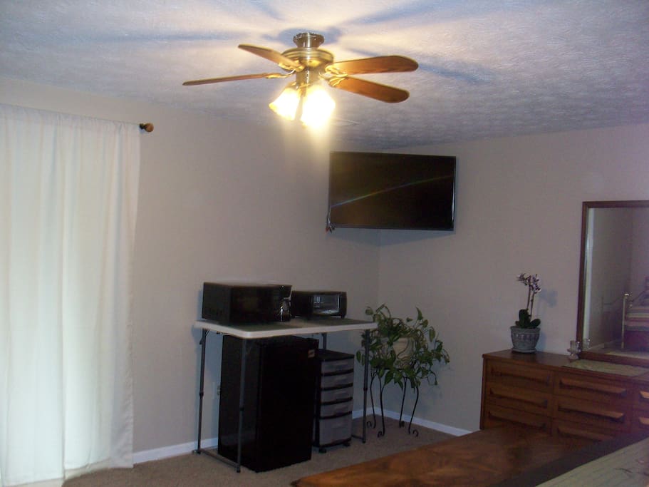 43' inch t.v., fridge, toaster oven, microwave and coffee maker