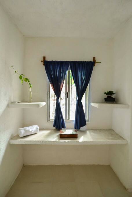 Nice window and a place where you can set up.