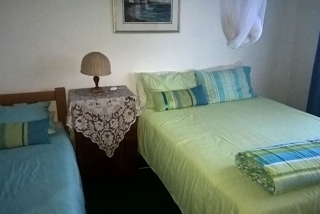 1 x Double Bed and 1 x Single Bed with sea view