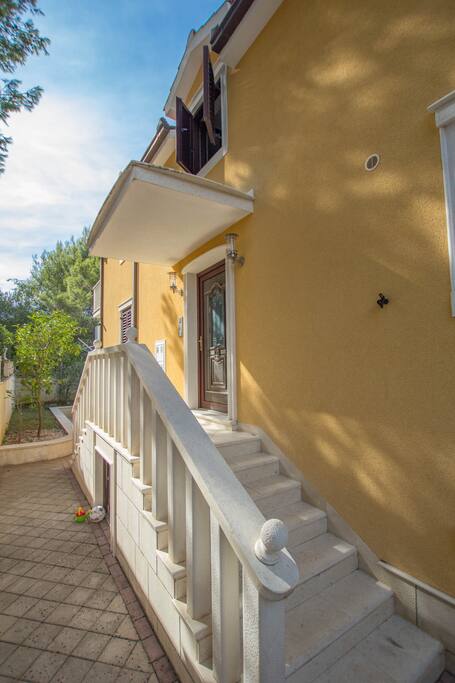 The entrance to stairway to the apartment