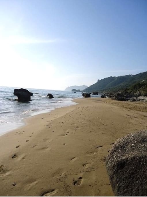 secluded sandy bays 8 minutes walk way on the right hand side of the beach