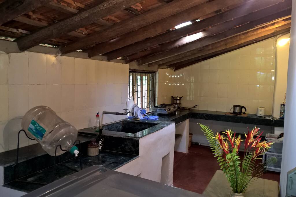 Kitchen Area with fridge, gas, toaster,electric kettle, mineral water & cooking facilities.