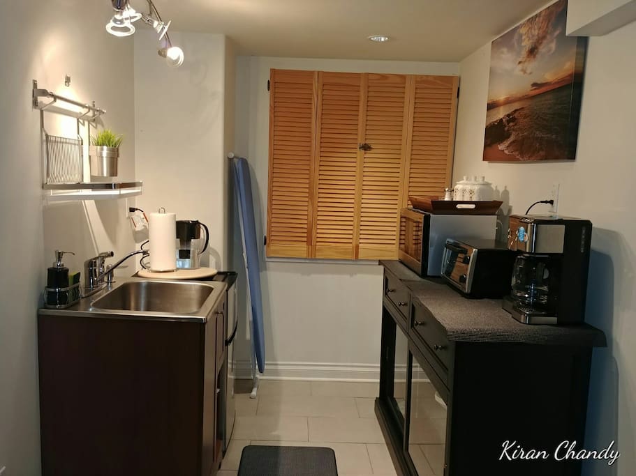 Kitchenette equipped with fridge, Microwave, Oven, Coffee maker, Dishes, Cutlery