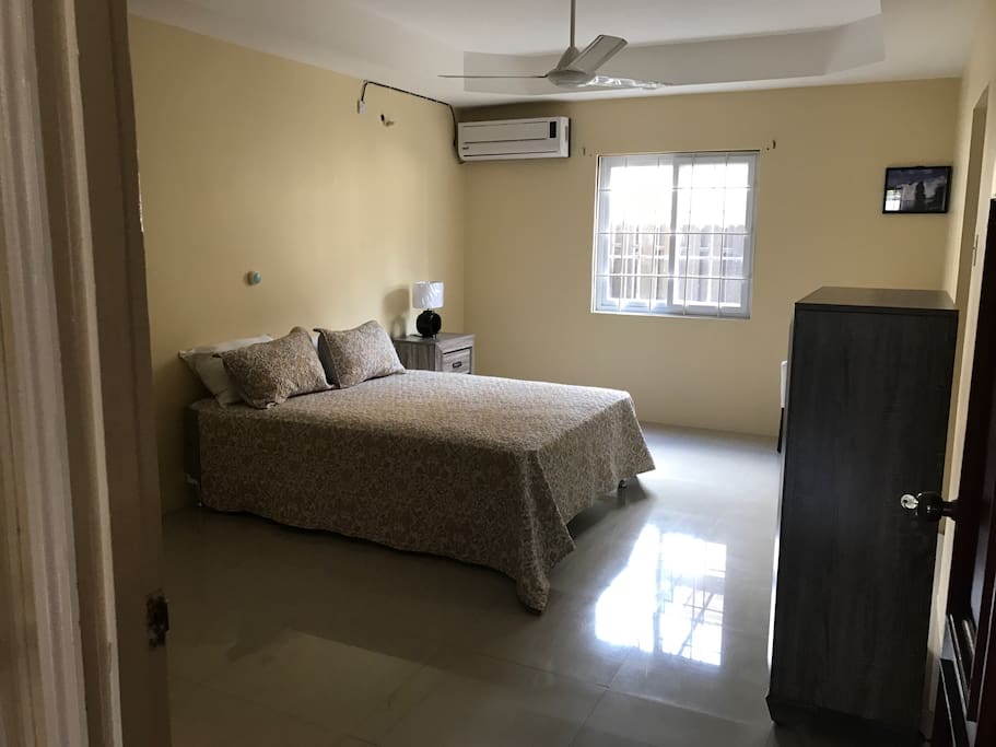Master bedroom with queen bed