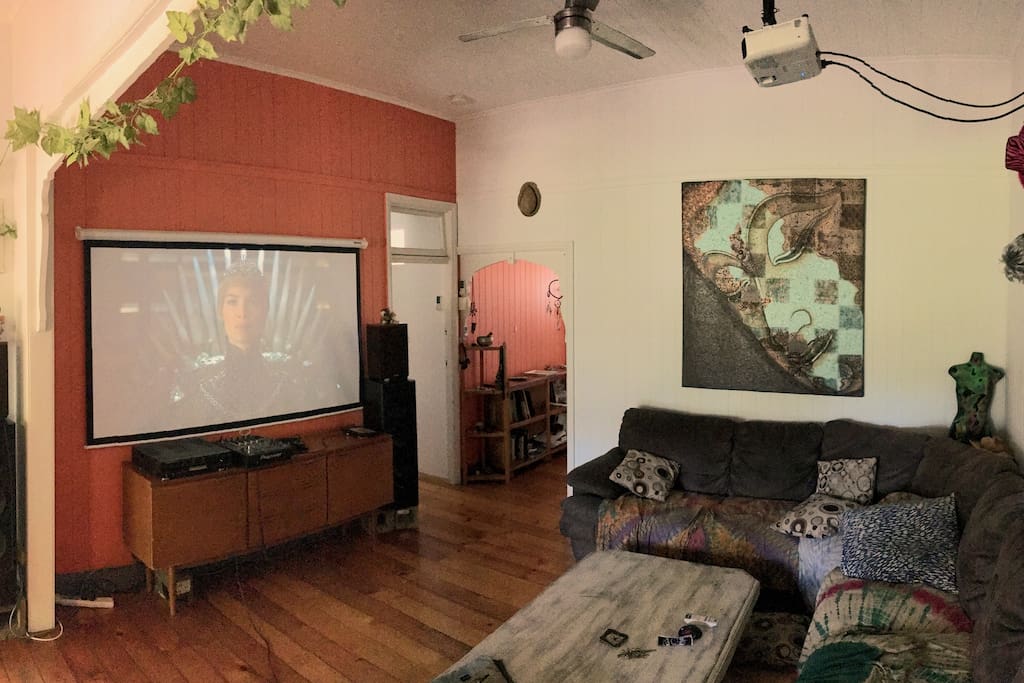 The open and spacious lounge room with projector #2
