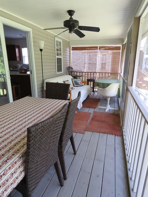 Spacious screened-in porch with fan and lights, nice view overlooking creek.