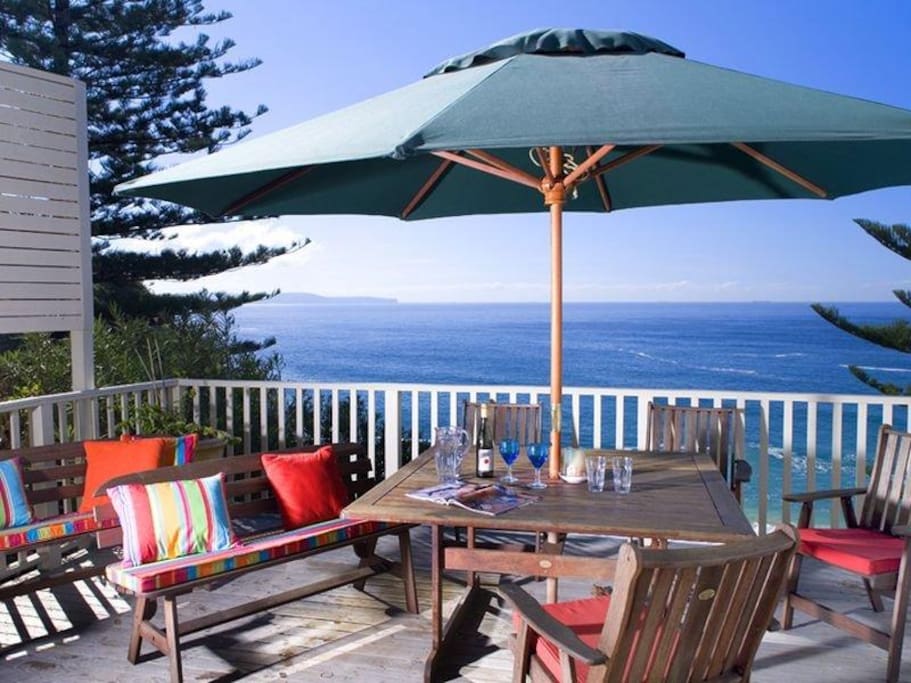Private deck area with ocean and garden views