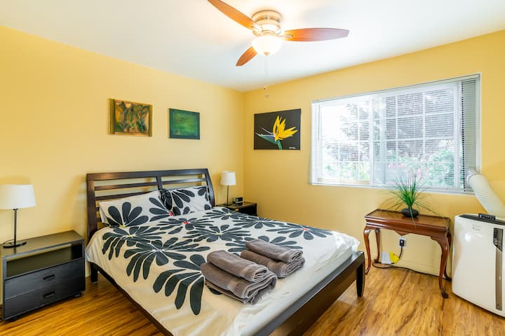 Master bedroom with a queen size bed