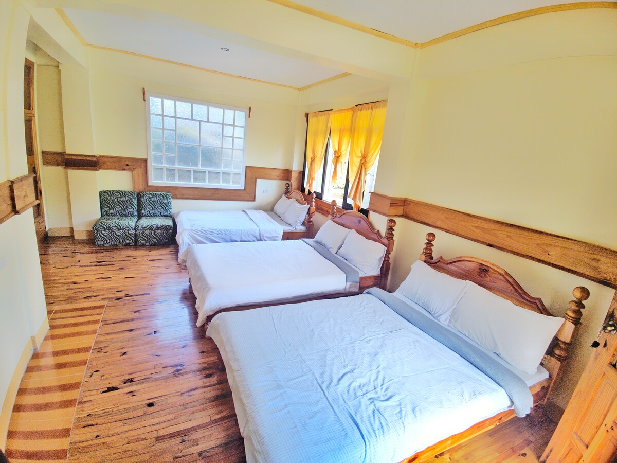 Namnama: a private room with 3 double beds at the lower floor of Inandako's Bed and Breakfast in Sagada.