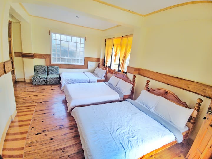 Namnama: a private room with 3 double beds at the lower floor of Inandako's Bed and Breakfast in Sagada.