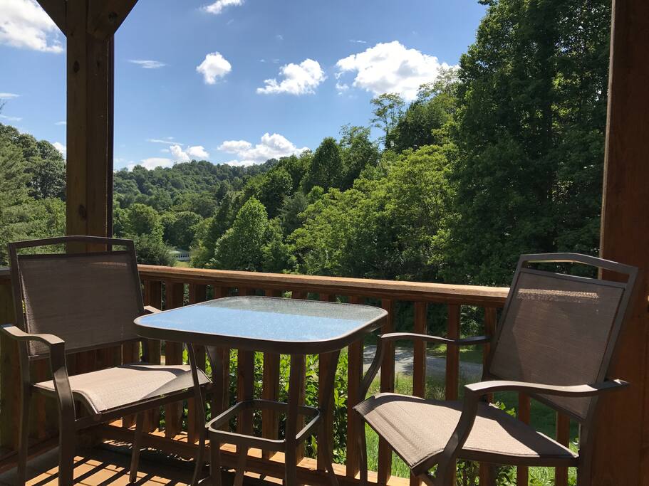 Bistro set in a peaceful mountain setting.