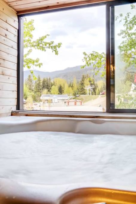 PRIVATE In-suite Hot Tub with view for soaking away sore muscle after a day on the slopes !