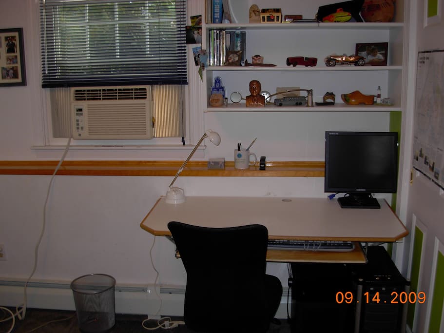 Has built in shelving in closet to right of desk. All objects will be removed from shelving.