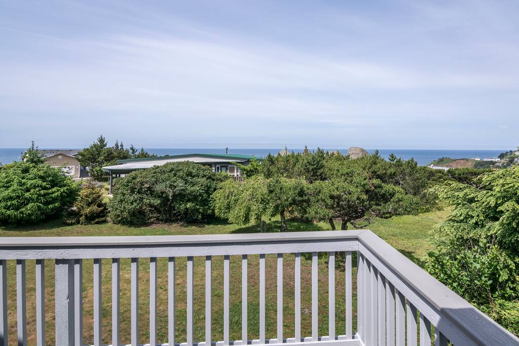 Enjoy reading or relaxing on this large deck facing the ocean.
