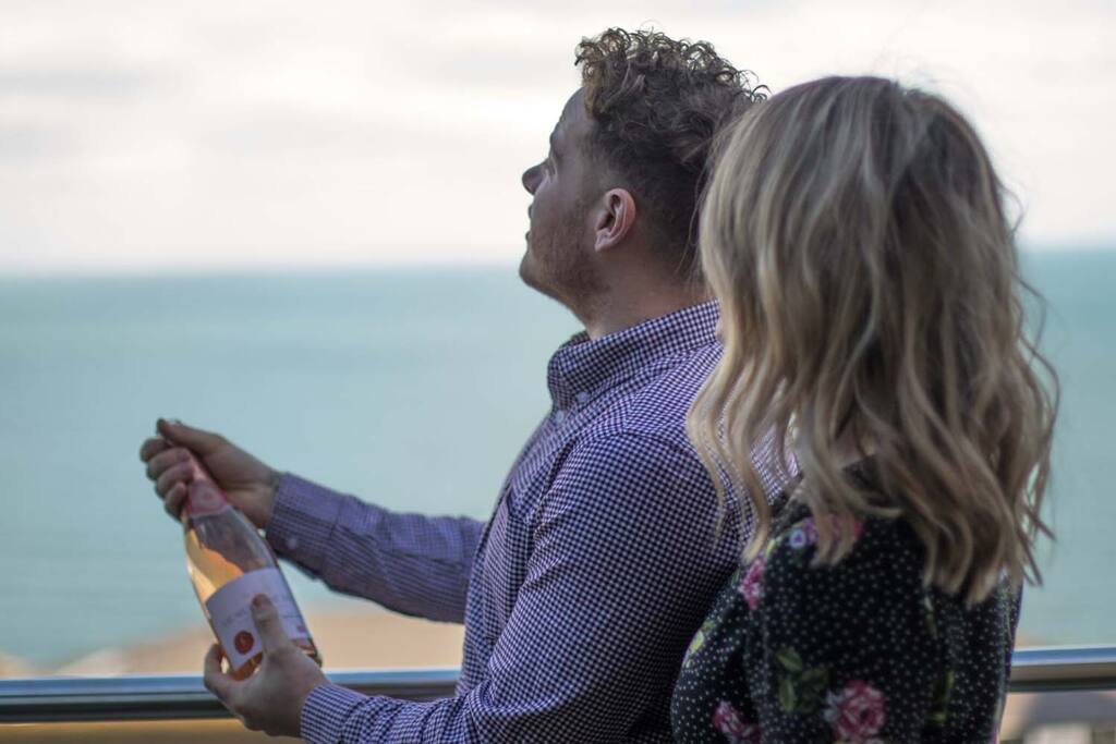 Enjoy a complimentory bottle of bubbles on your private balcony