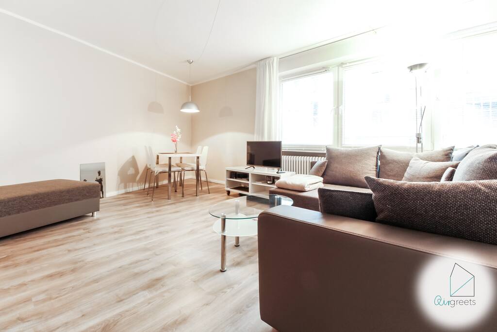 At the modern dining table, you can enjoy your delicious meals.