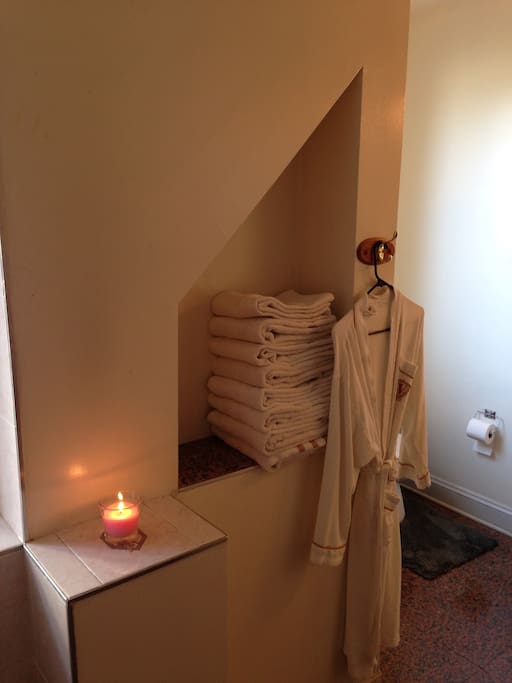 Nice clean bathroom with clean towel.