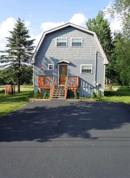 Front of house with paved driveway... plenty of parking!