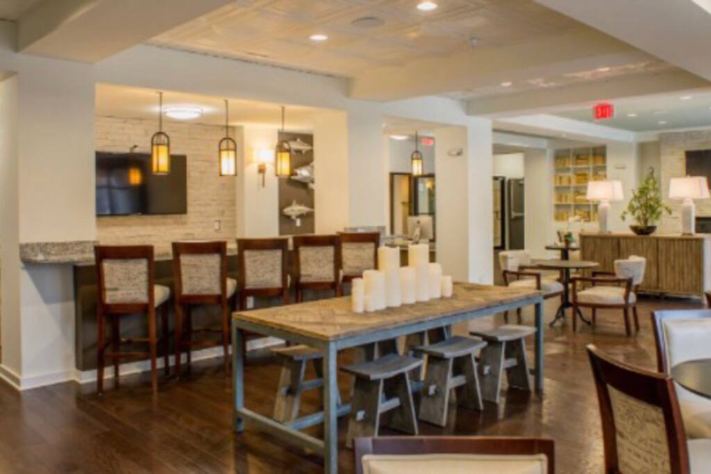 Main lobby- 2 large TVs, plenty of seating, ice machine, water machine, coffee and espresso machine.