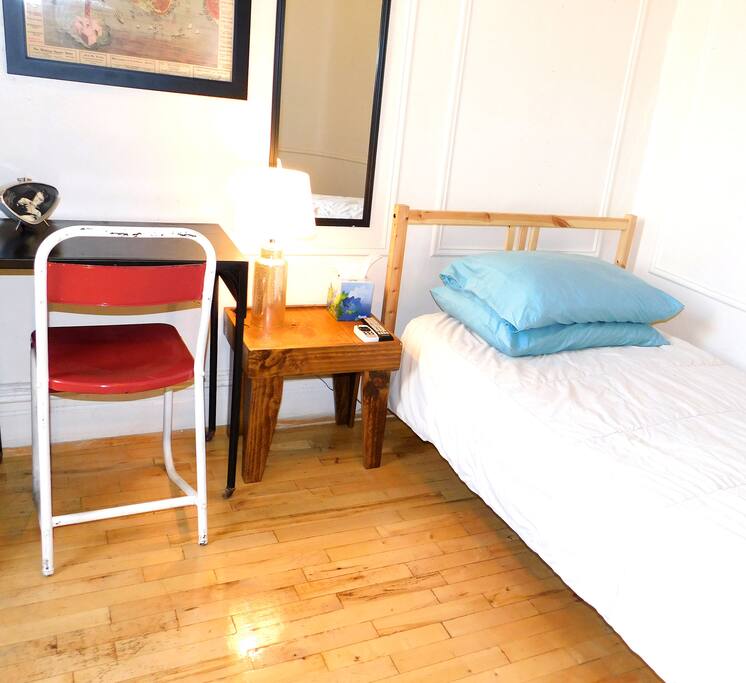 Wood framed twin sized bed