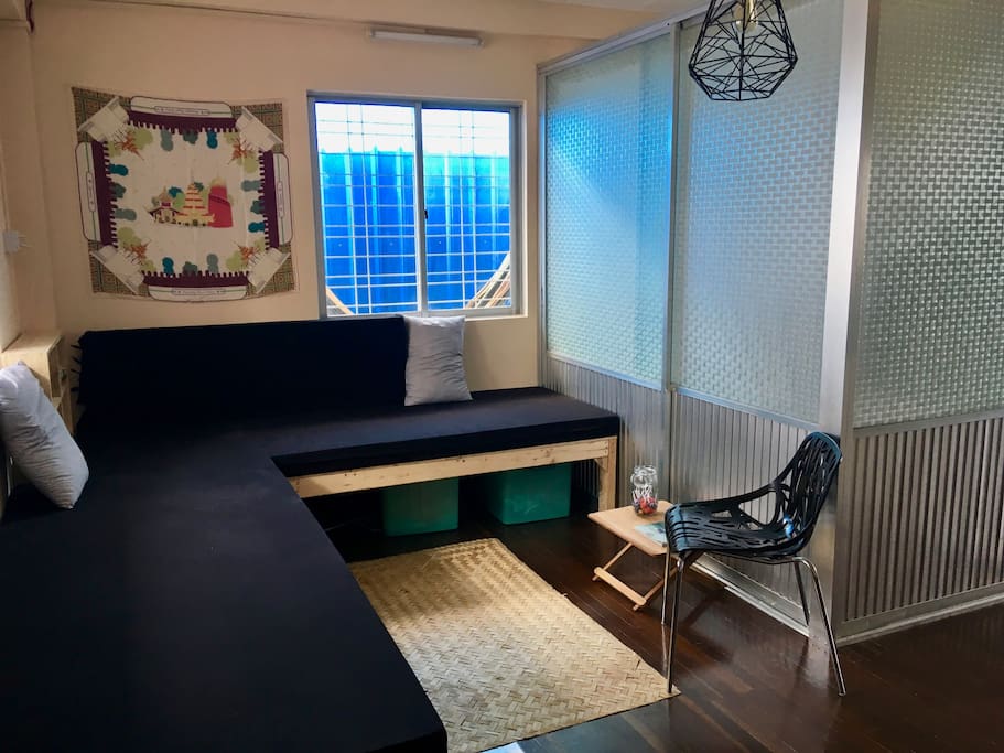 Living area with sofas and HD projector