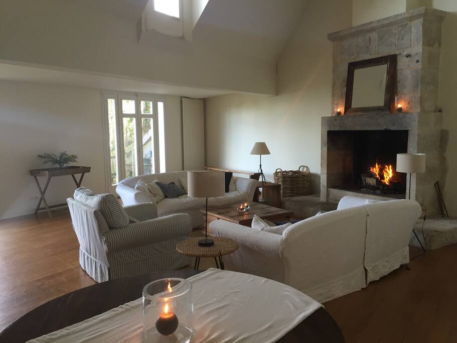 2nd reception room with large open fireplace, sea views, dining area and desk