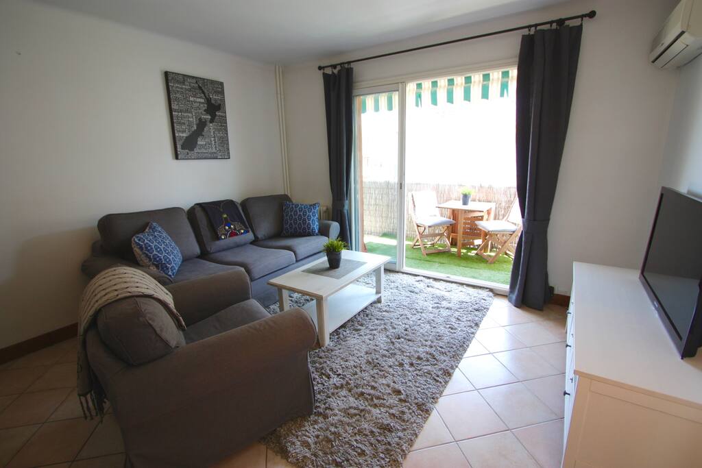 Lounge with with south facing balcony. Sofa bed can accommodate 2 people. Lounge is air-conditioned.