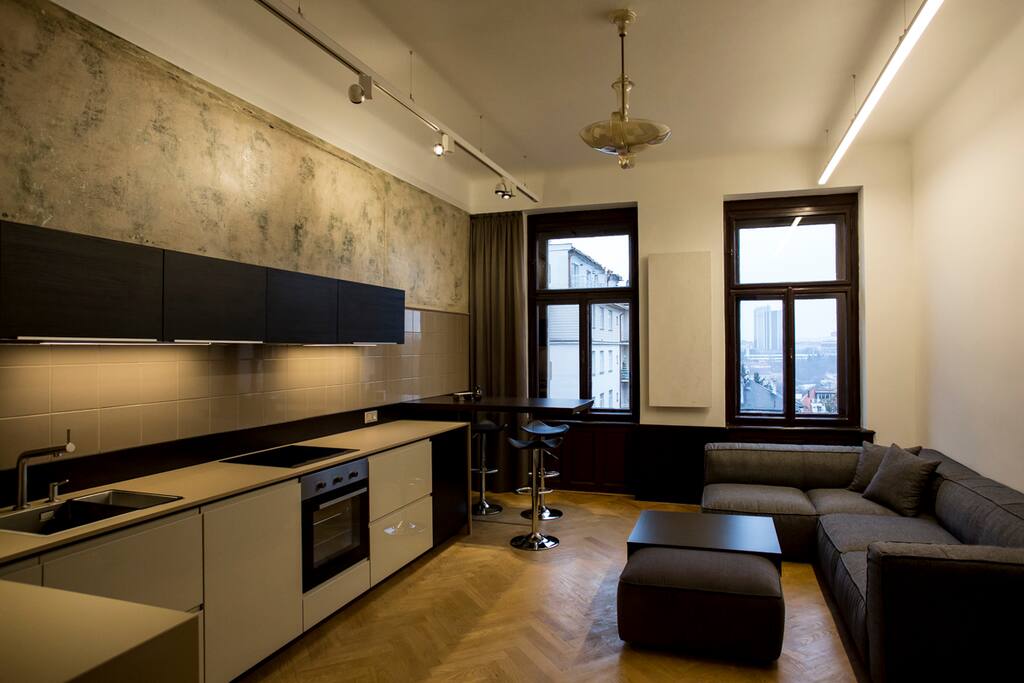 The living room offers unique view of the Nusle valley.