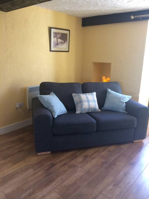 Sofa bed in rear living area