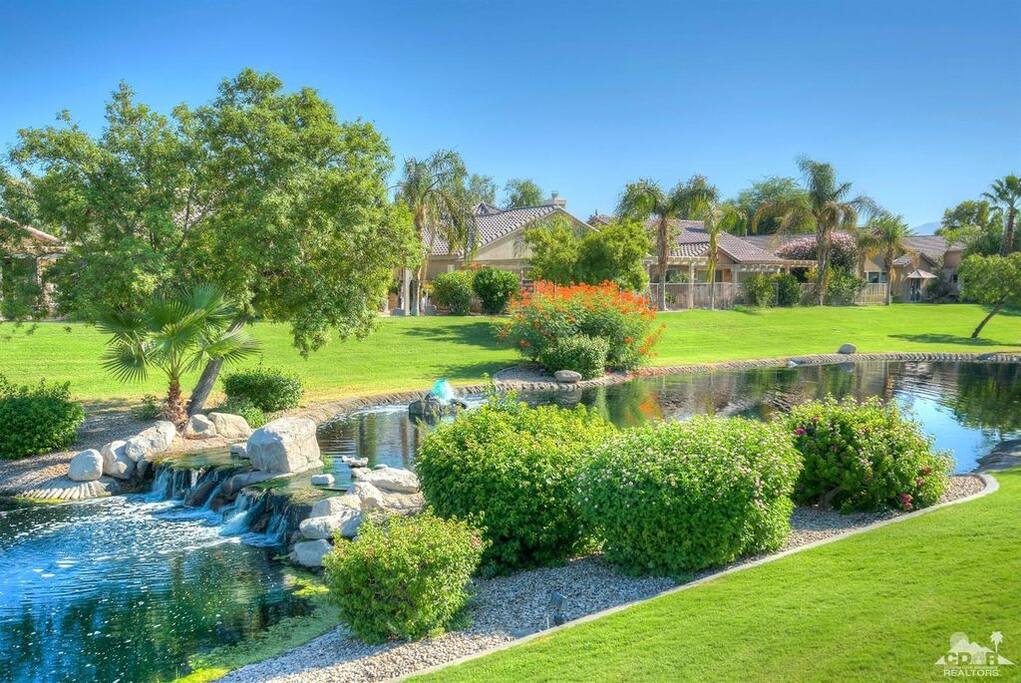 Water feature and green belt that can be viewed from the patio and two of the bedrooms!