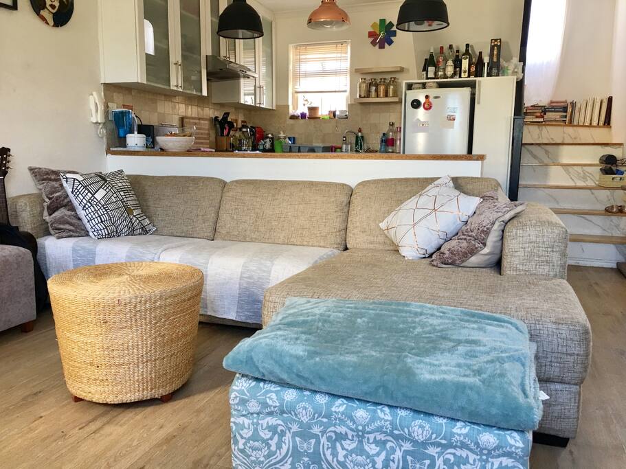 Lounge area. Very comfortable Weylandts couch and two ottomans for extra seating if necessary.