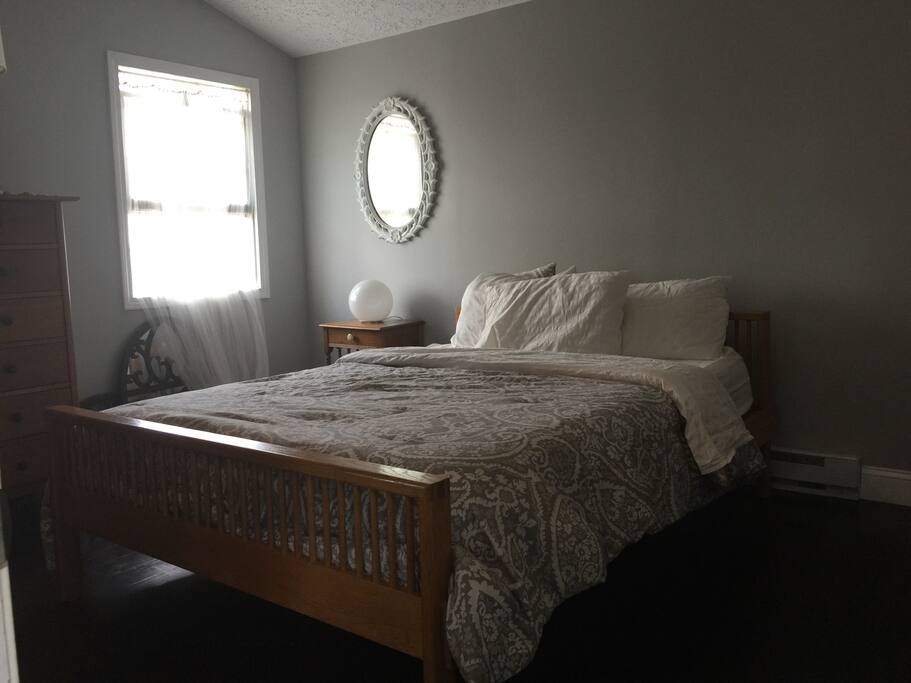 Queen size bed, clean sheets, cathedral ceilings and lots of natural light.