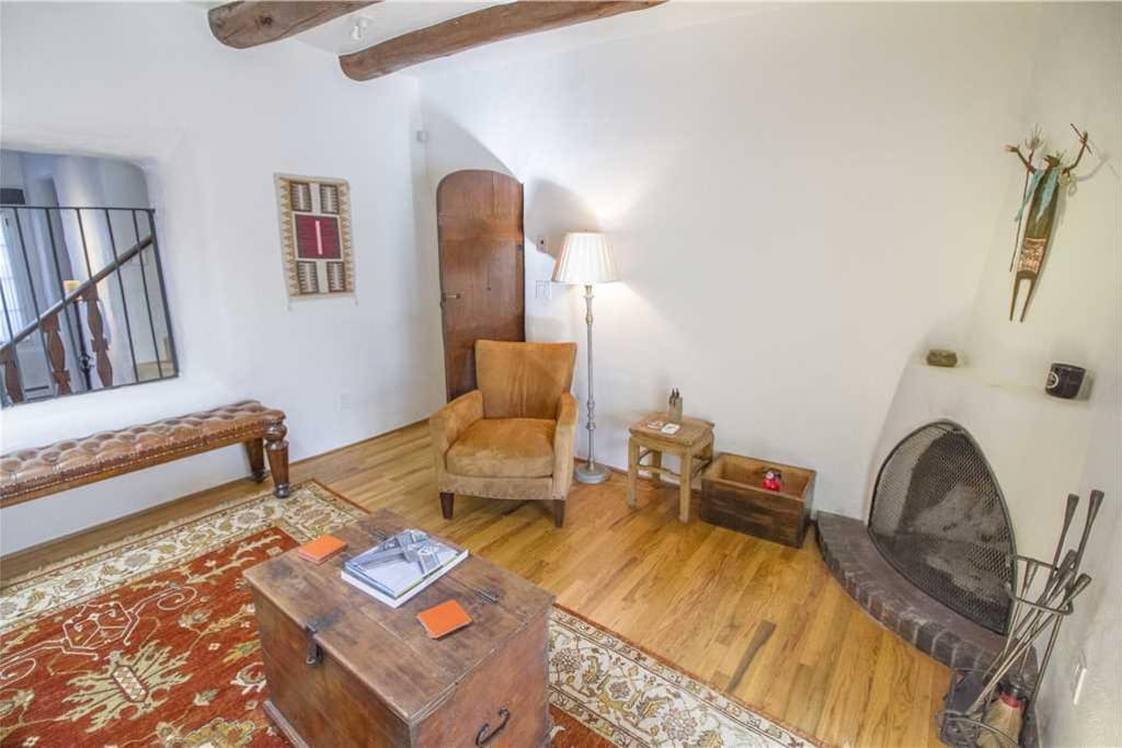 A good time is waiting - Grab a book or magazine and enjoy the warmth of the living room fireplace.