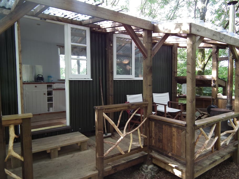 Our shepherd's hut with veranda - outdoors but sheltered!