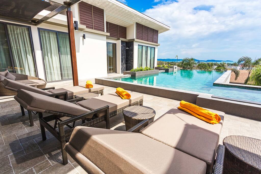 Sun beds next to the swimming pool