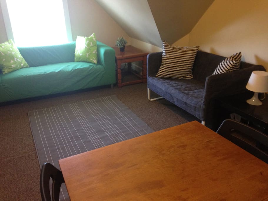 The bed goes where the table is currently. The bed is a queenzied two fee of the ground airbed.
