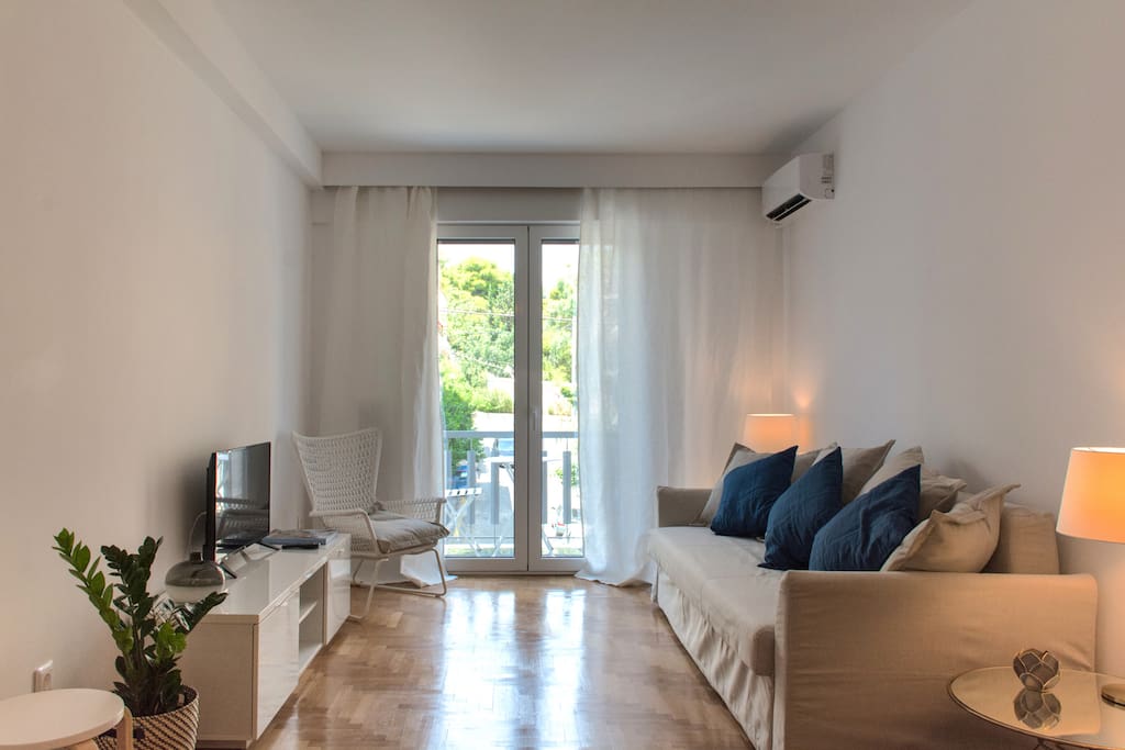 Living room with balcony in the background