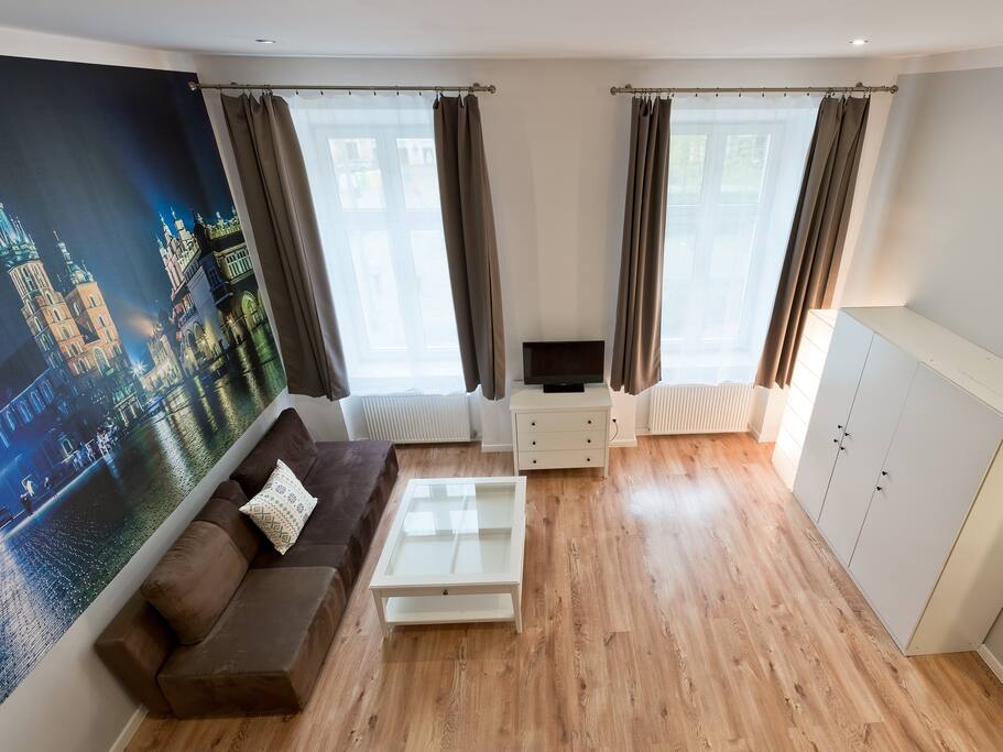 The spacious living room with an entresol