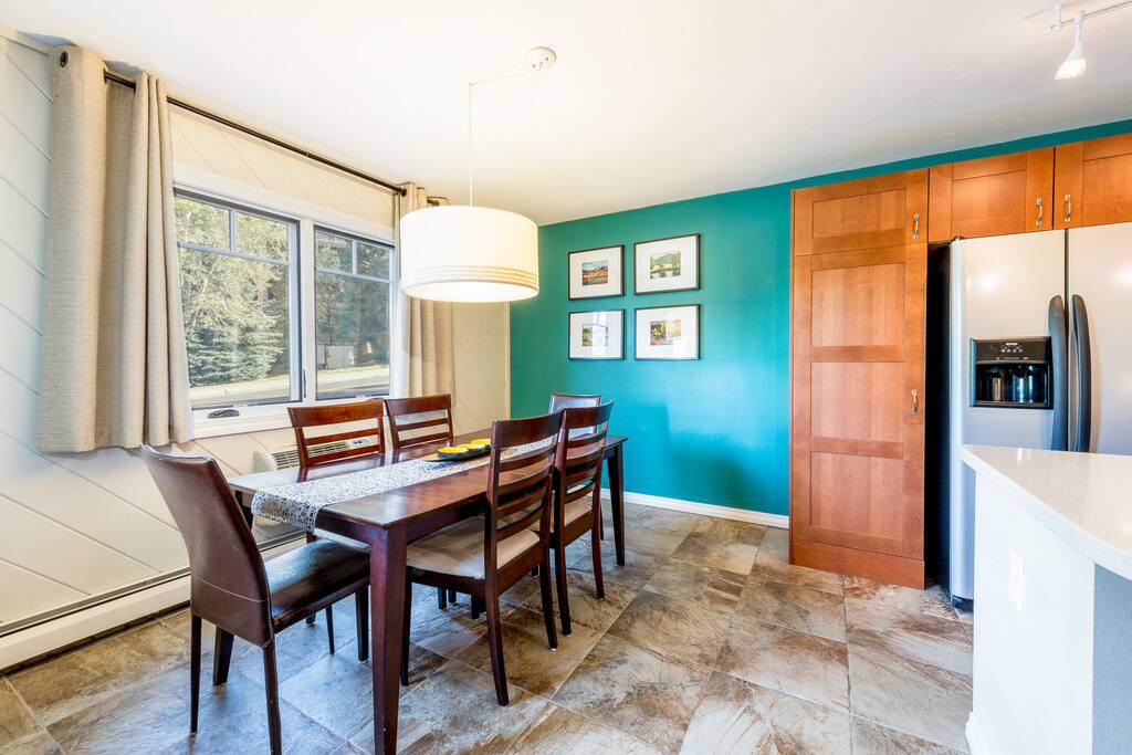 Dining area comfortably seats 6 for a cozy breakfast or formal dinner.