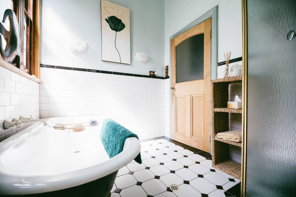 Private bathroom with bath and shower, toilet