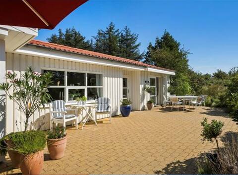 Cozy holiday home in Blokhus with outdoor hot-tub