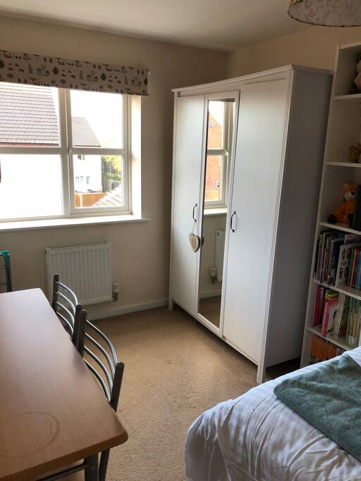 Double wardrobe in bedroom.