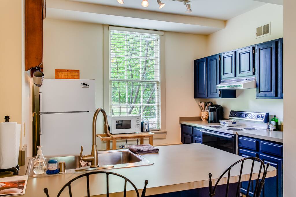 You'll find fully stocked kitchen with all cooking amenities.