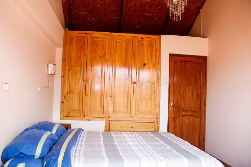 Bed for two with big wardrobe.