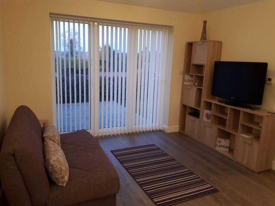 Lounge with sofa bed away. DVD player and TV (awaiting aerial and WI-FI)
