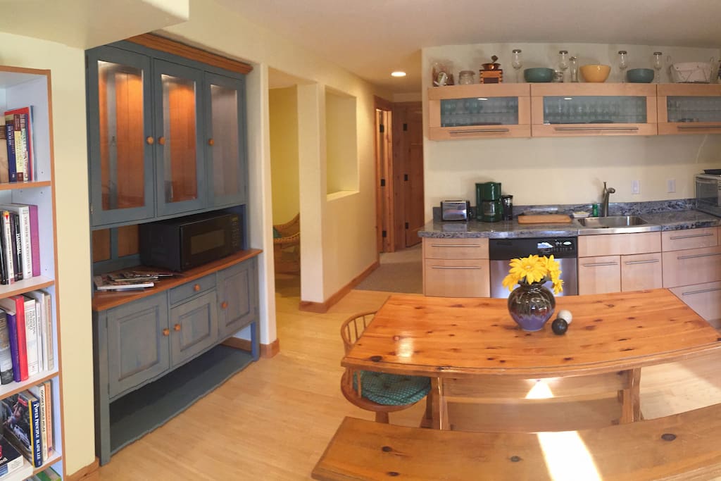 Kitchenette with microwave, refrigerator, toaster oven, electric skillet, coffee maker and coffee grinder.