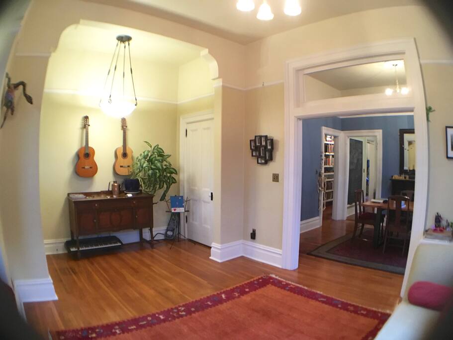 Front entry and peek into to dining room.